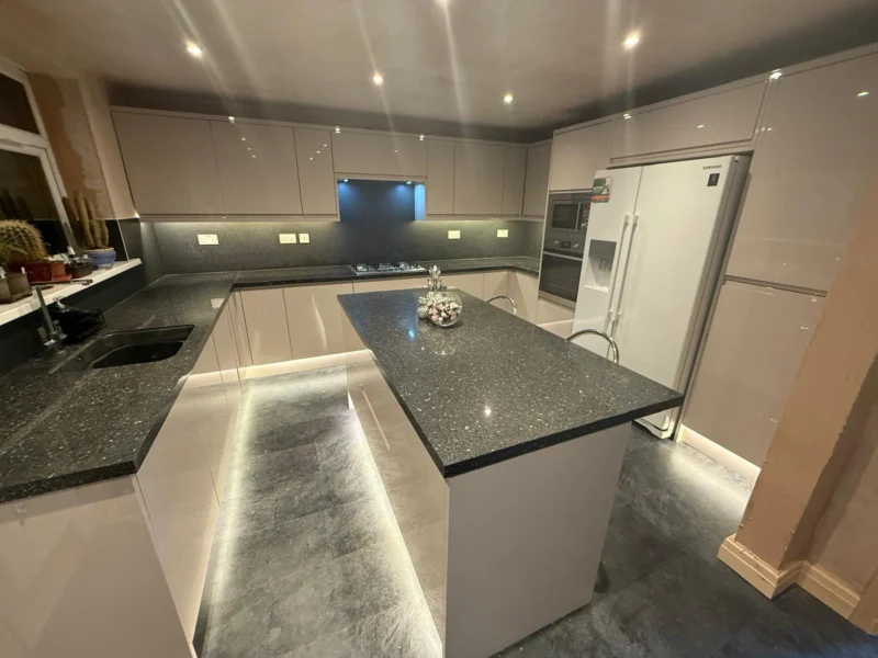 Cashmere gloss with lit island – kitchen fitted by Cash and Carry Kitchens, Blackpool