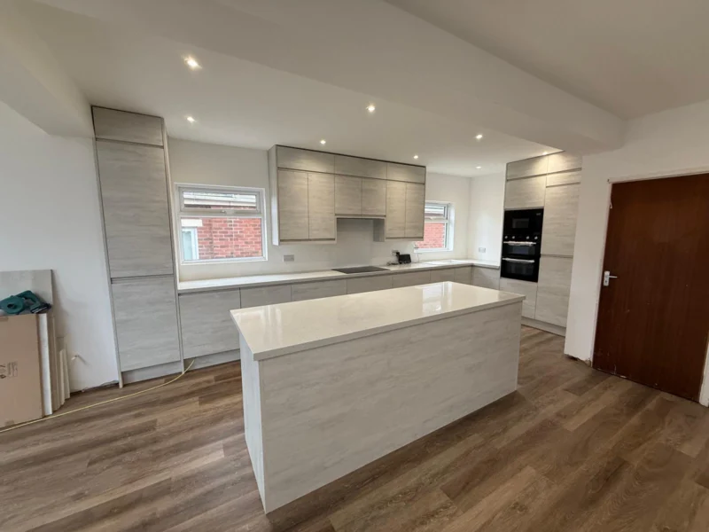 Concrete-effect with long island – kitchen fitted by Cash and Carry Kitchens, Blackpool