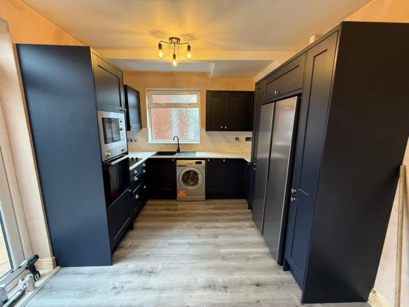 Navy shaker, marble worktop – kitchen fitted by Cash and Carry Kitchens, Blackpool