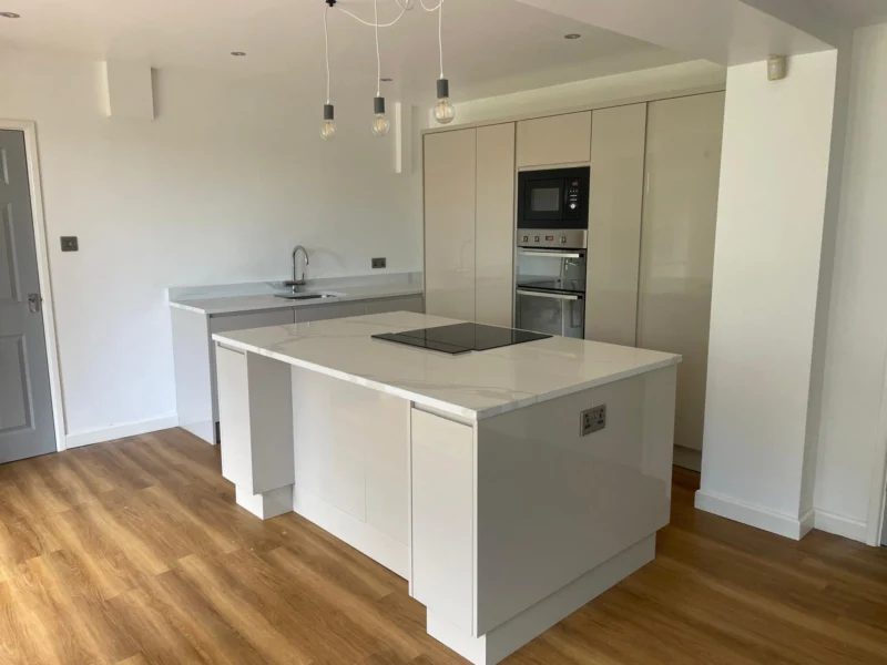 White gloss island, marble top – kitchen fitted by Cash and Carry Kitchens, Blackpool